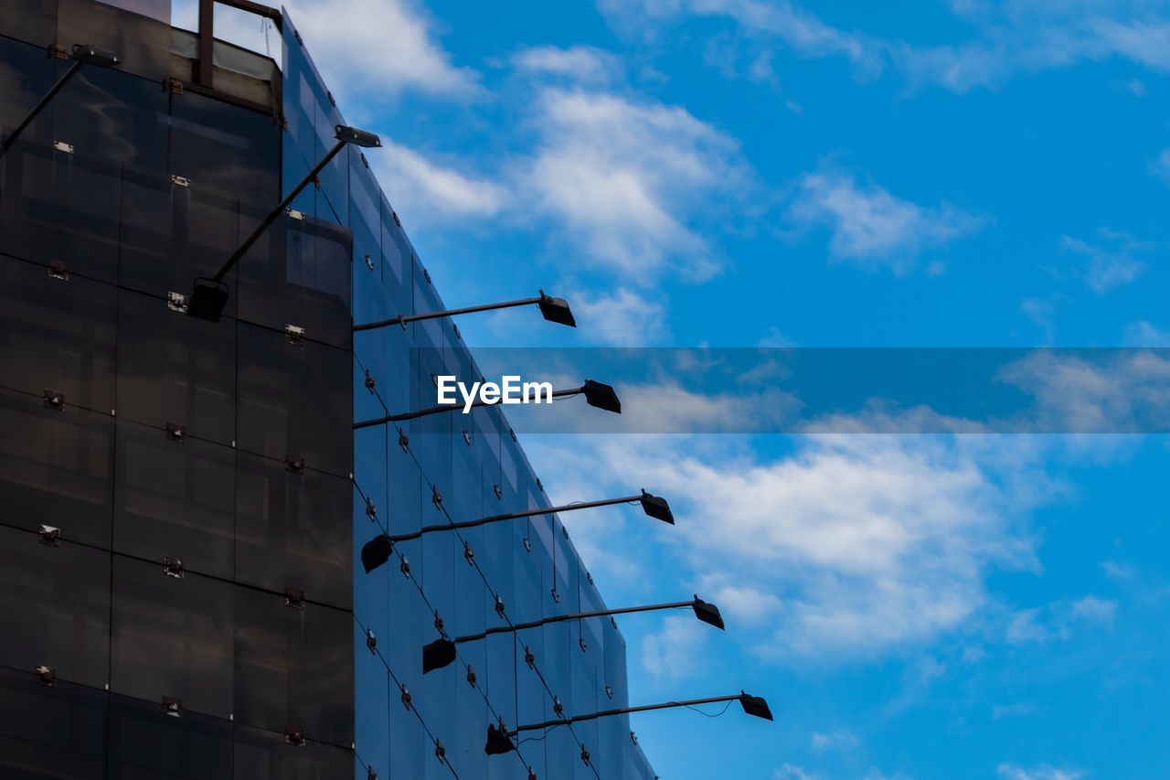 Windows on modern building and blue sky