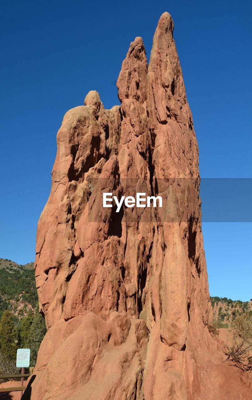 LOW ANGLE VIEW OF ROCK FORMATIONS