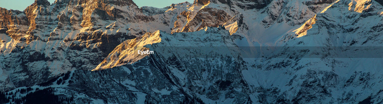 PANORAMIC VIEW OF SNOWCAPPED MOUNTAIN