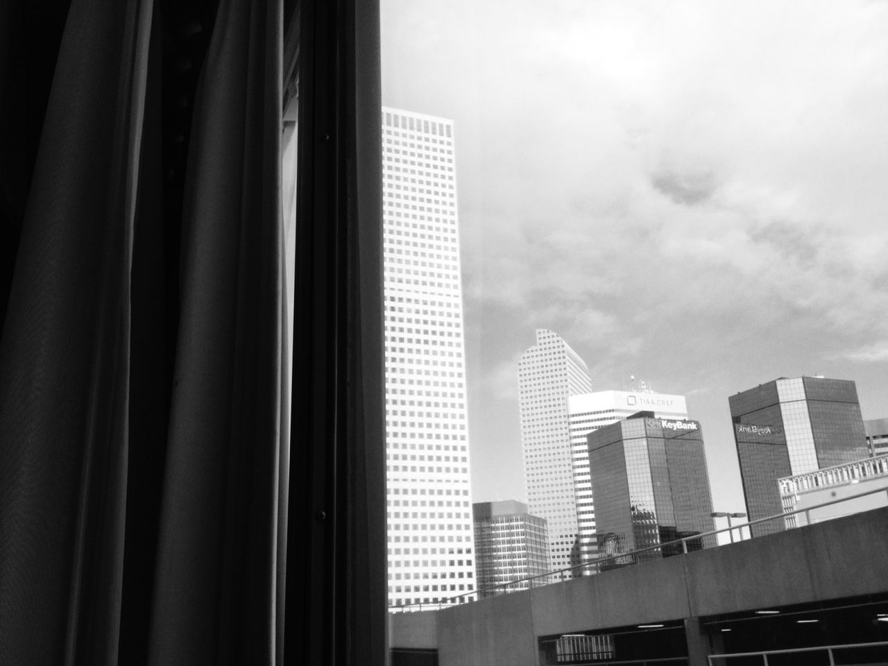 View of modern skyscrapers seen through window