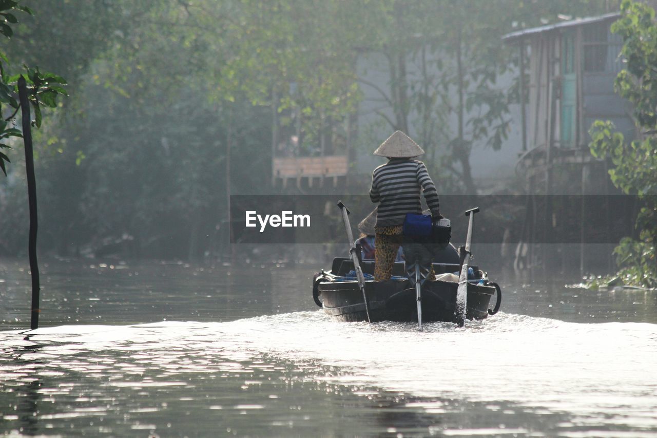 Man in boat on lake