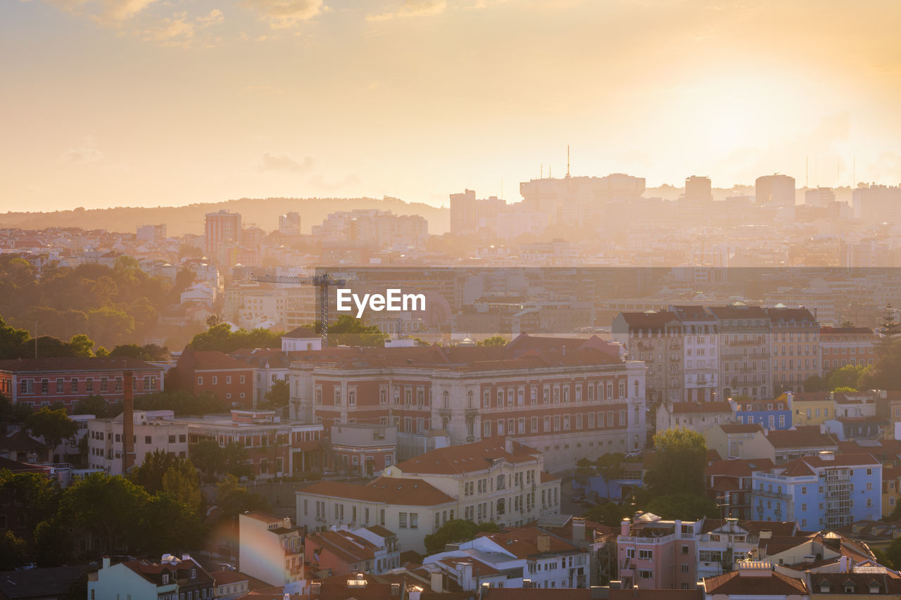 Sunset contre-jour view of lisbon from miradouro da senhora do monte viewpoint. lisbon, portugal