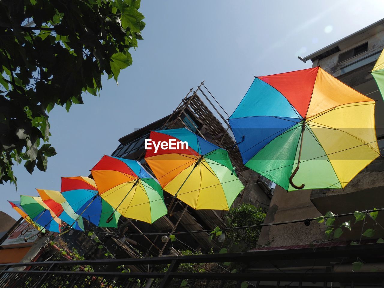 LOW ANGLE VIEW OF FLAGS AGAINST SKY