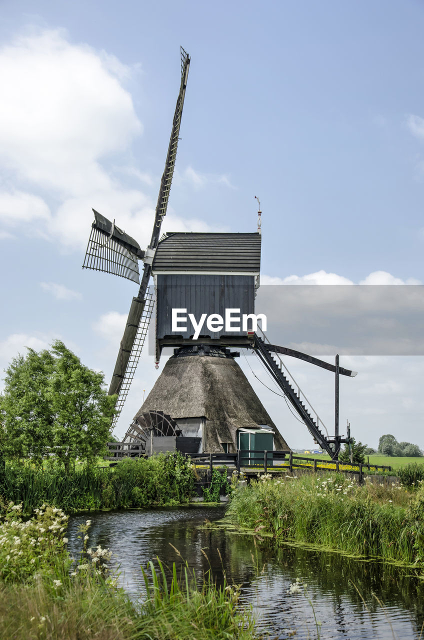 Dutch windmill and canal