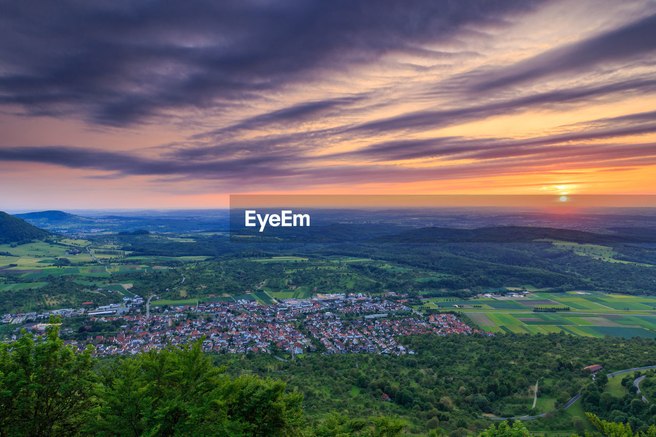 Scenic view of landscape against sky during sunset