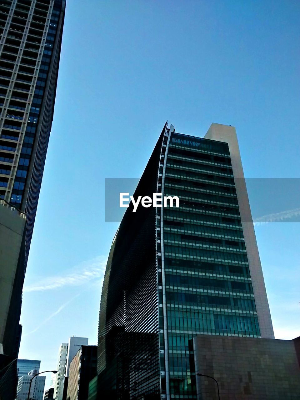 LOW ANGLE VIEW OF MODERN BUILDINGS