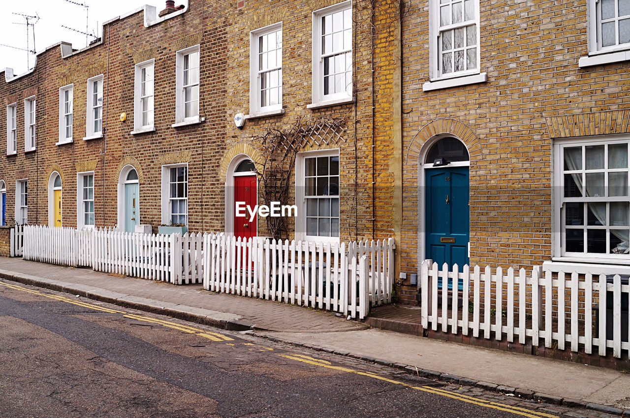 View of building with colorful doors 