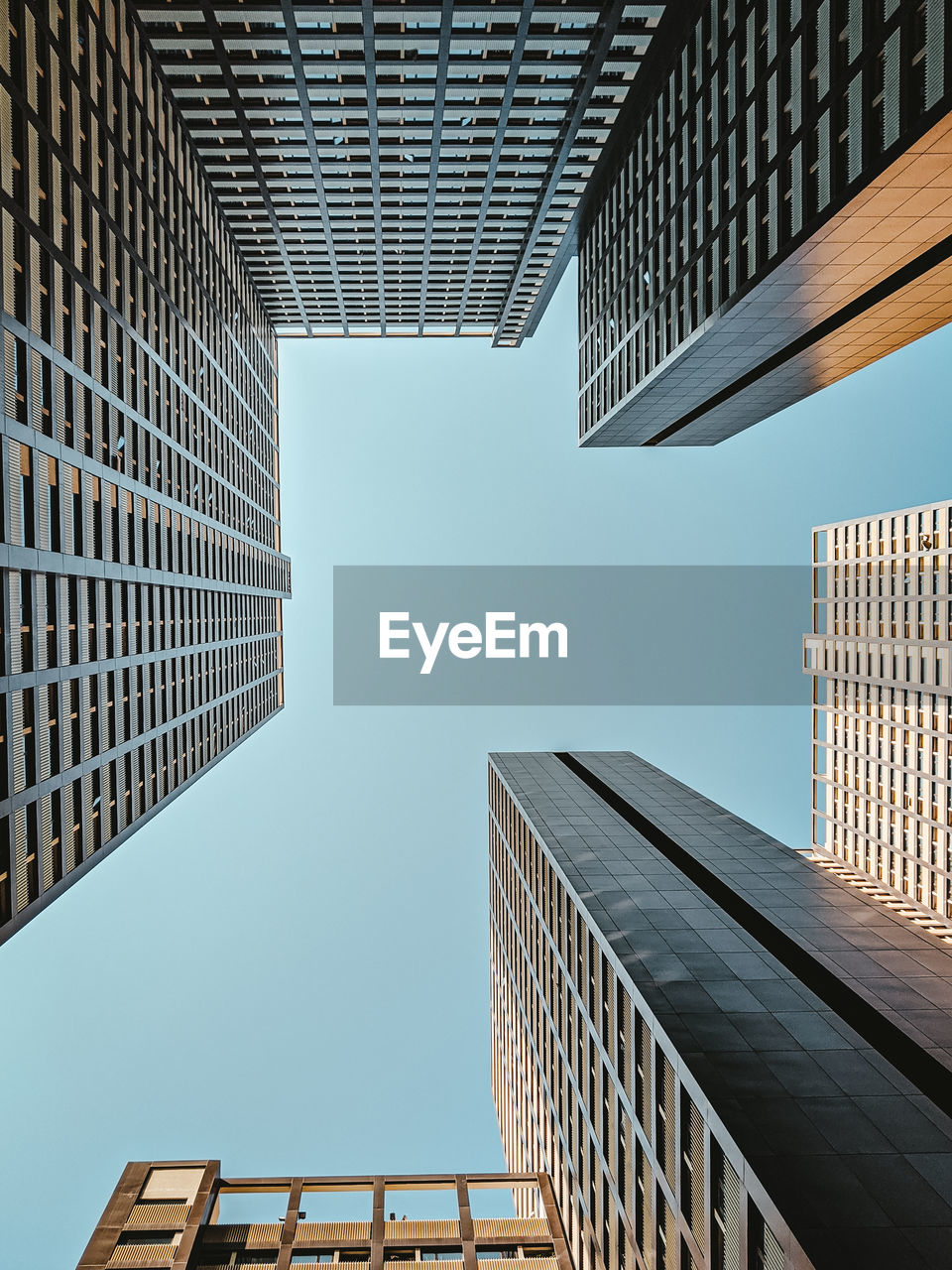 Low angle view of buildings against clear sky