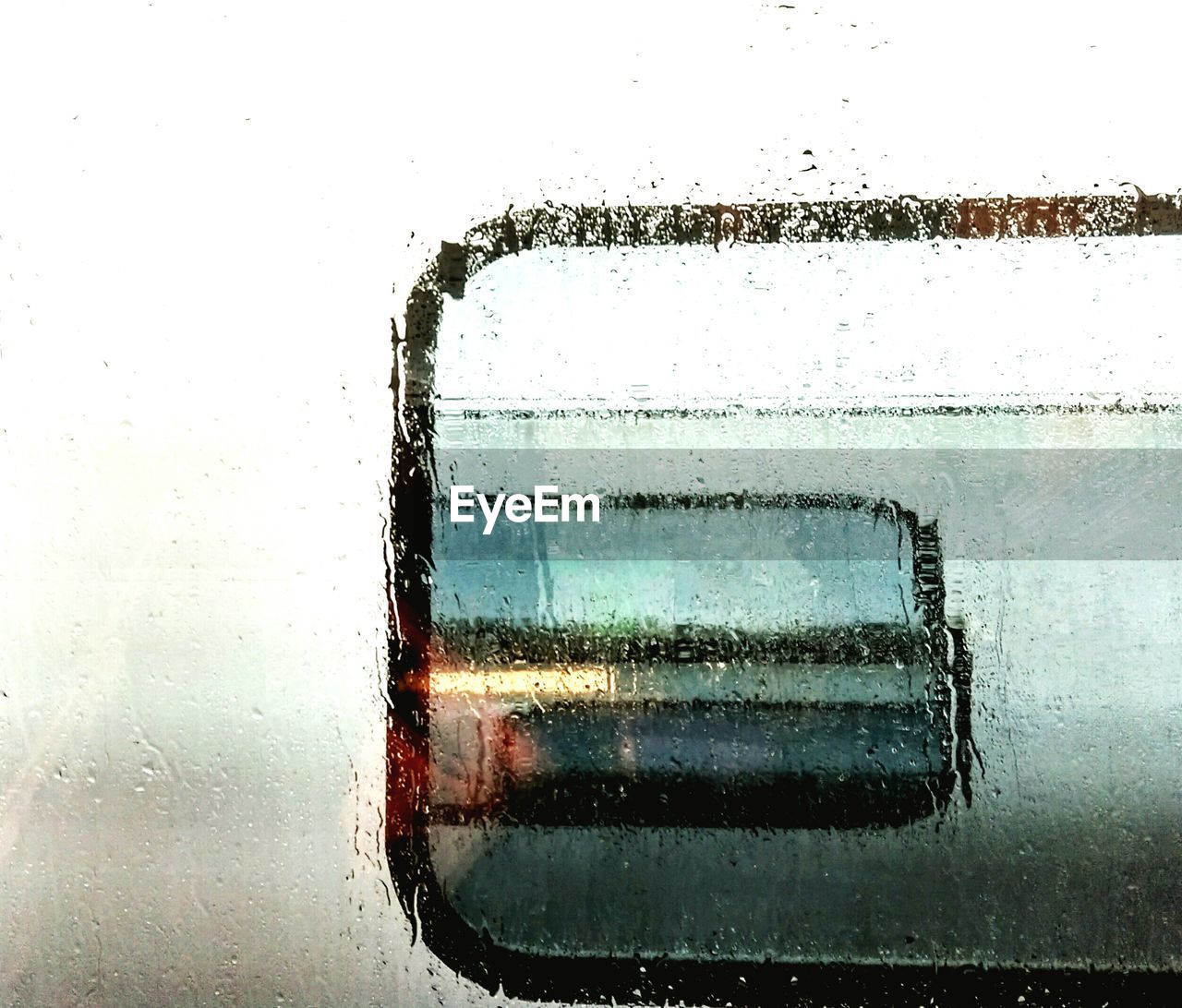 Close-up of rain drops on window glass