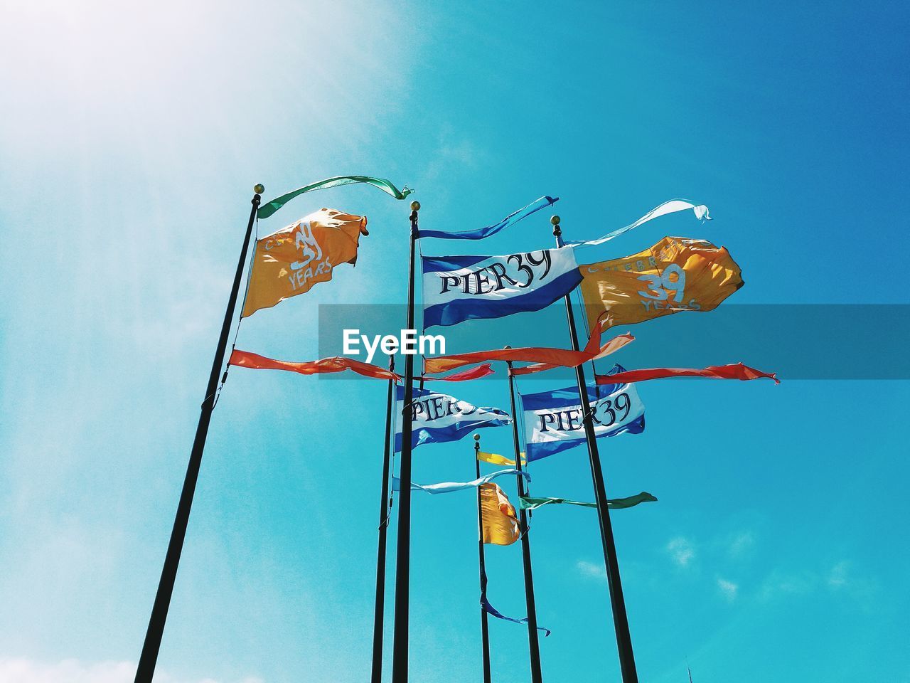 LOW ANGLE VIEW OF SIGN AGAINST SKY