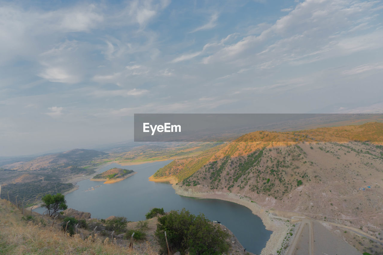 PANORAMIC VIEW OF LANDSCAPE AND TREES AGAINST SKY