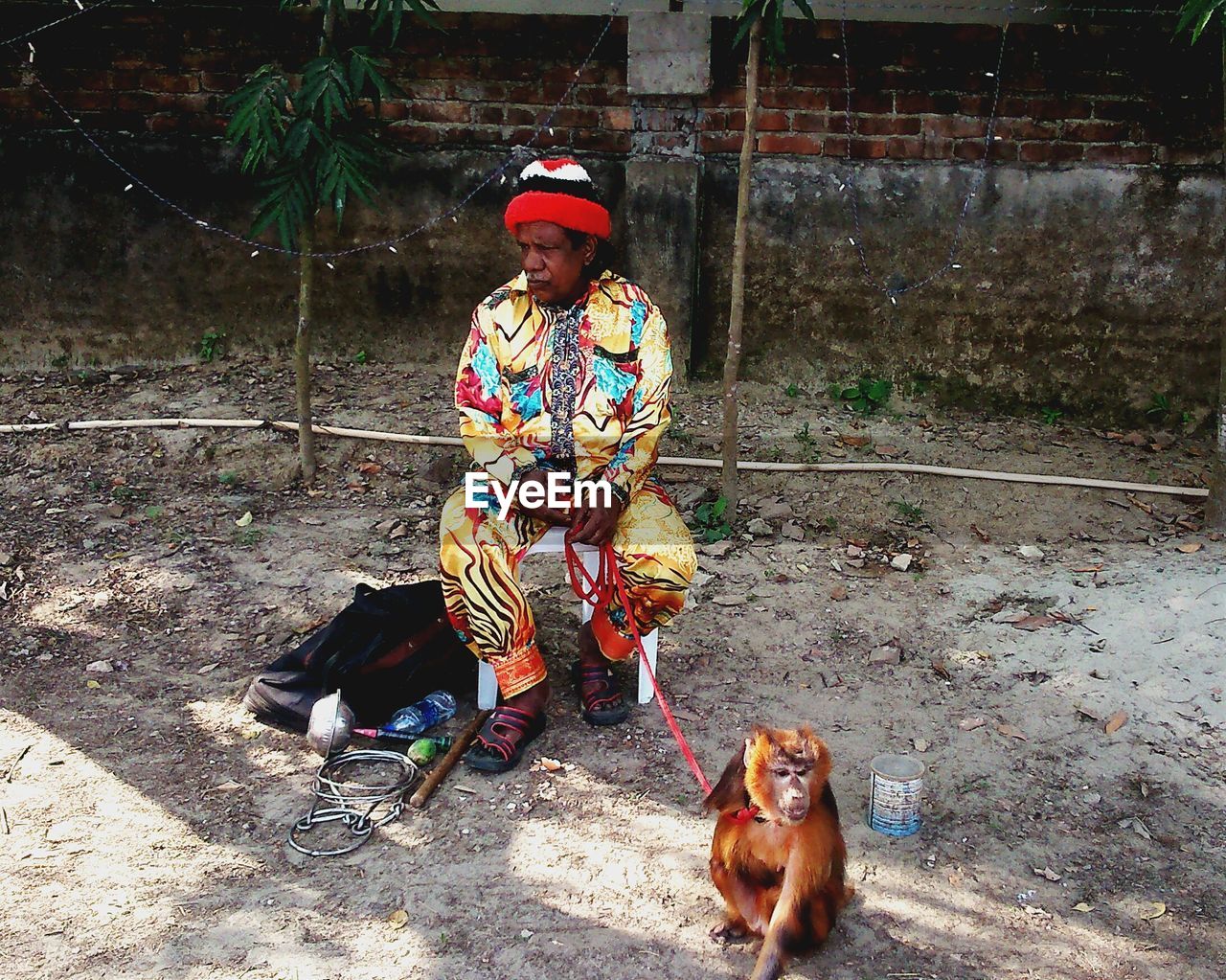 WOMAN WITH DOG ON THE STREET