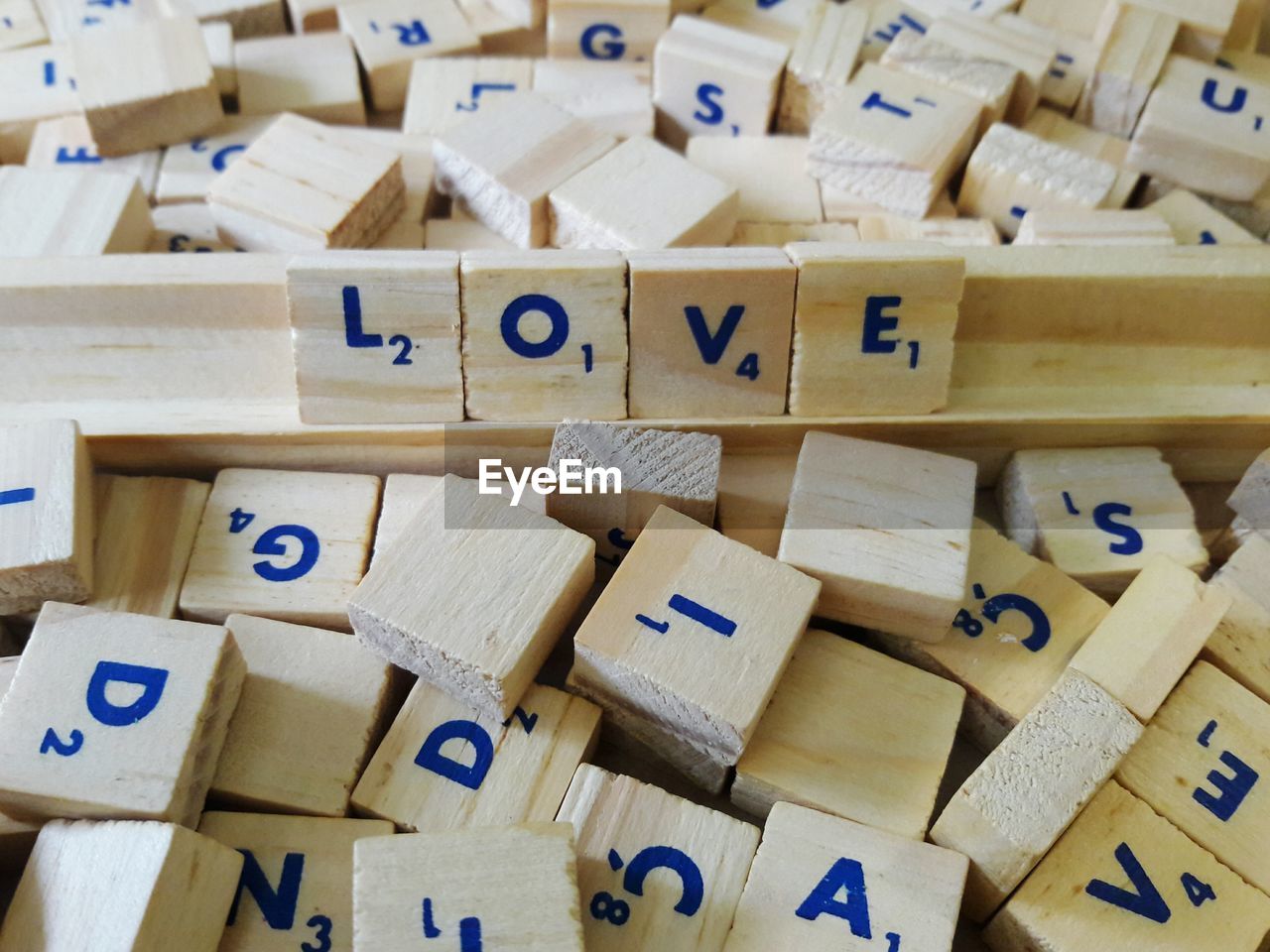 Full frame shot of various toy blocks with alphabets