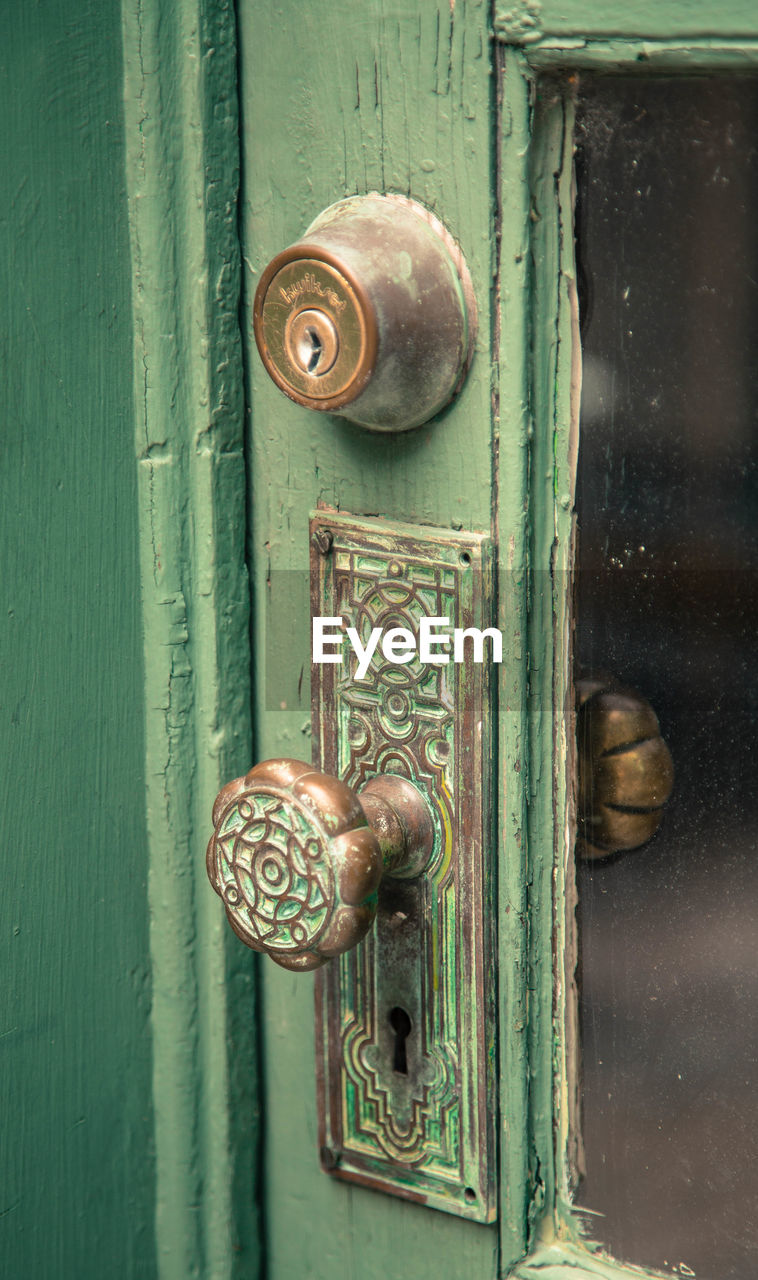 Cropped image of door with key hole and knob