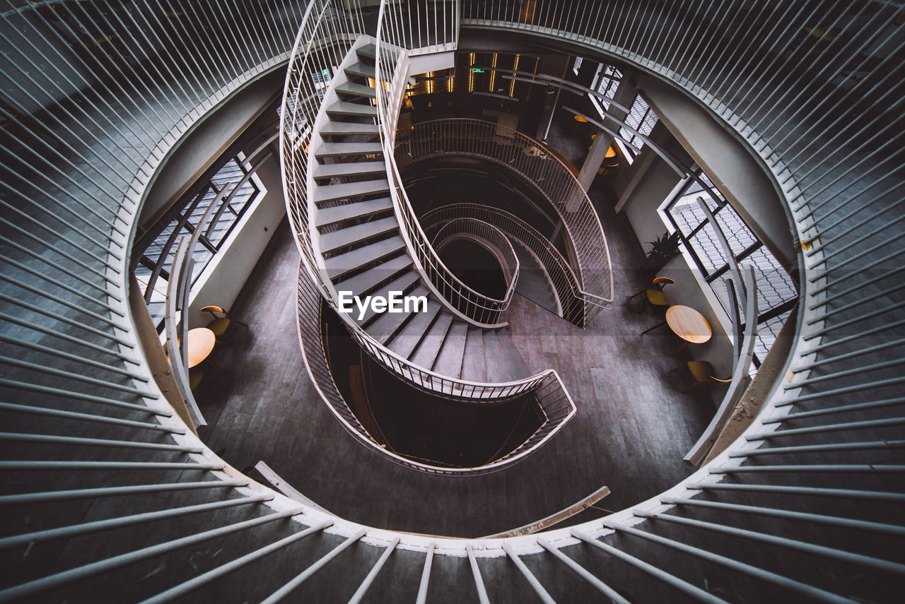 HIGH ANGLE VIEW OF SPIRAL STAIRCASE