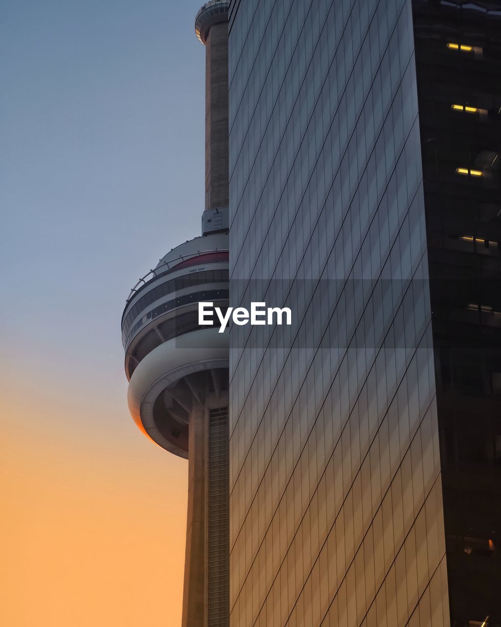 LOW ANGLE VIEW OF BUILDINGS AGAINST CLEAR SKY