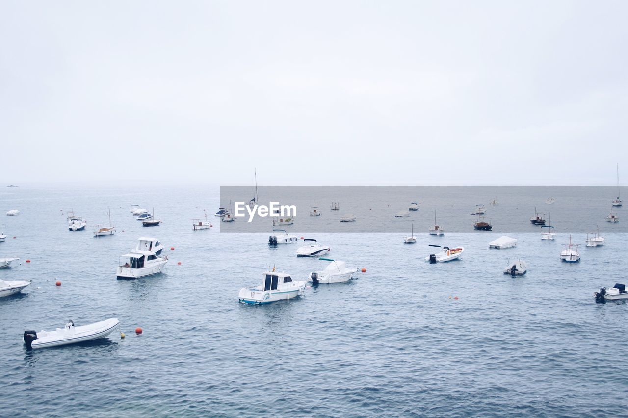 View of boats moving in sea