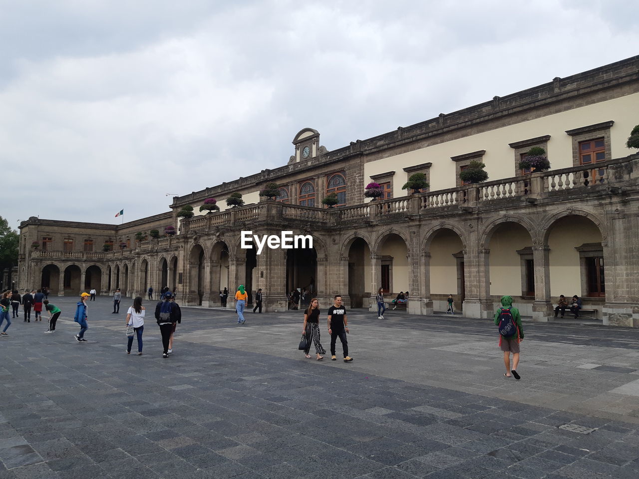 Group of people in front of historical building