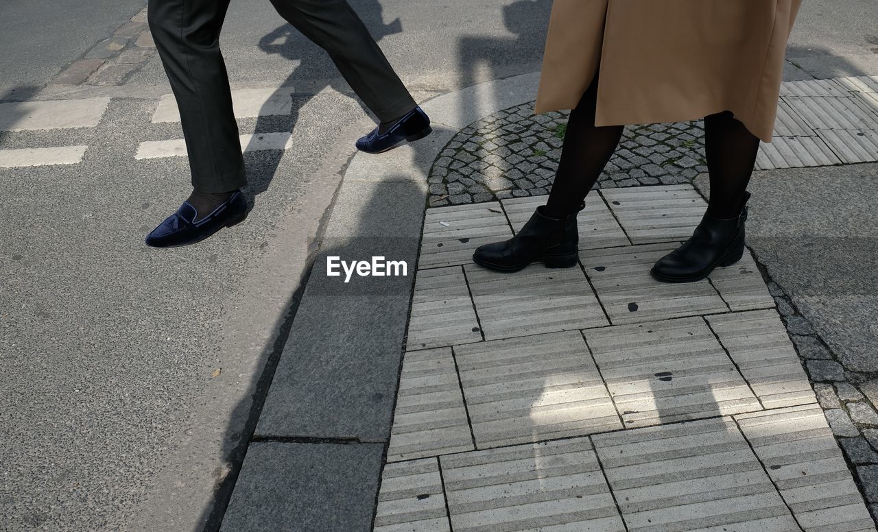 Low section of people walking outdoors