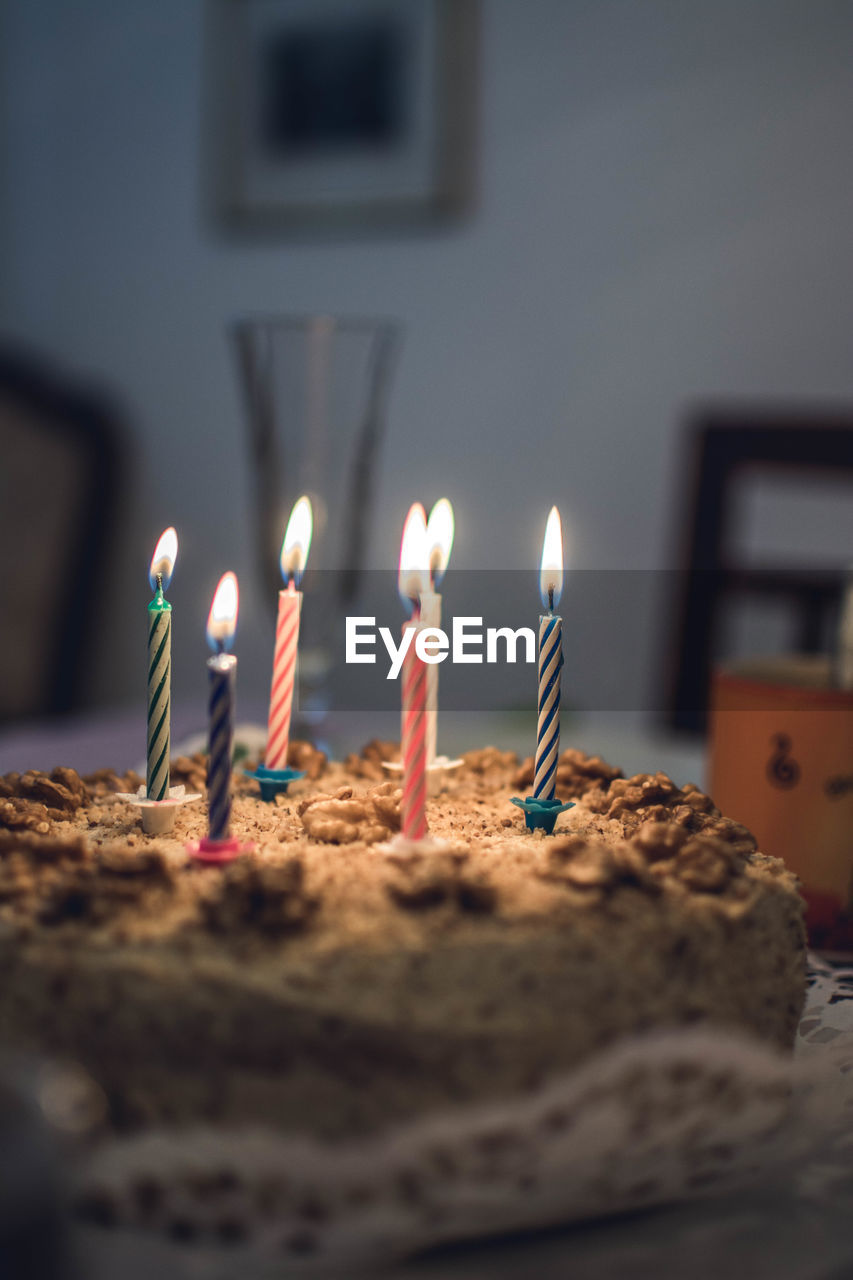 View of candles on cake