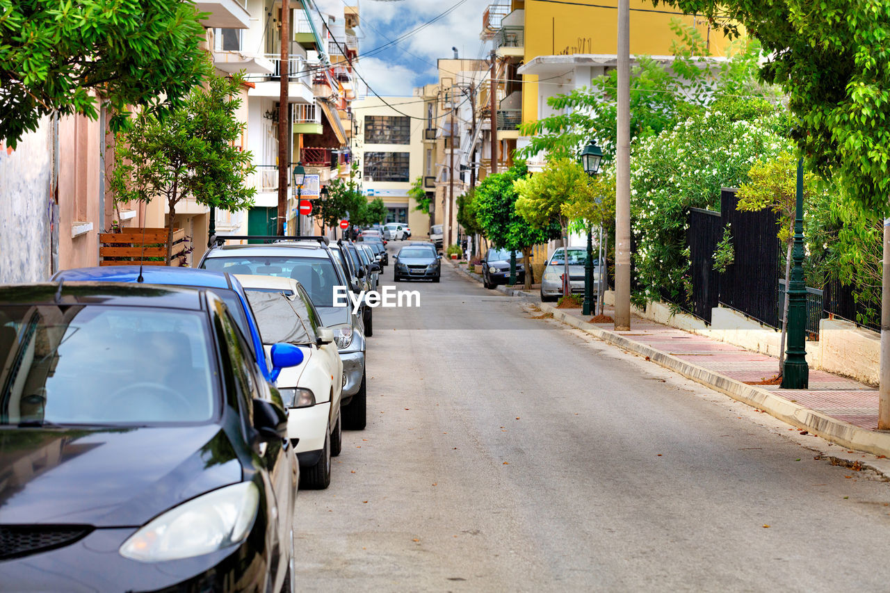 VIEW OF STREET AMIDST BUILDINGS