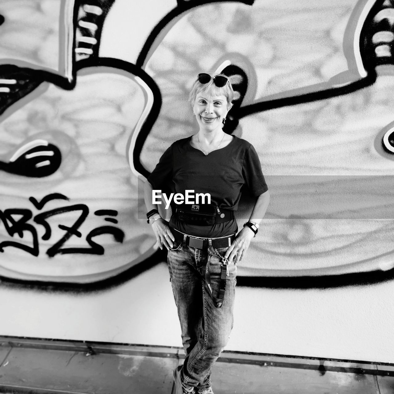 Me, standing in front of a grafitti-wall