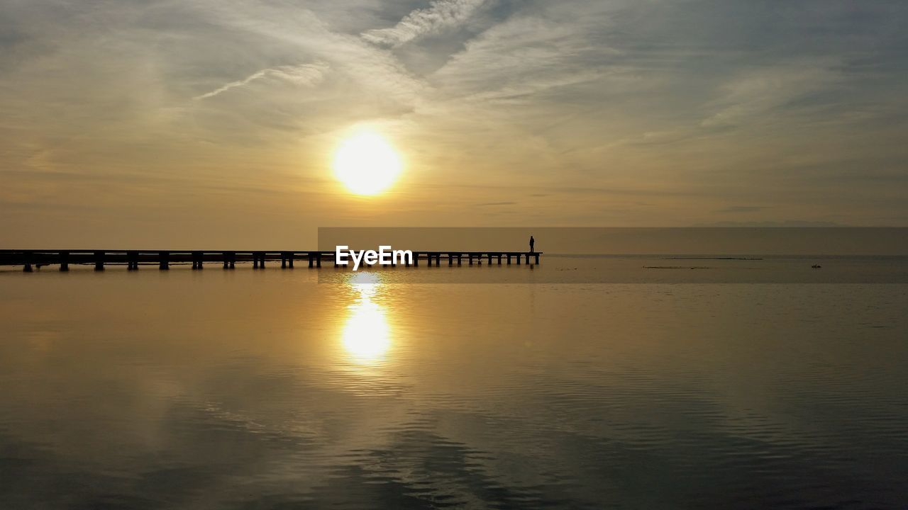 Scenic view of sunset over sea