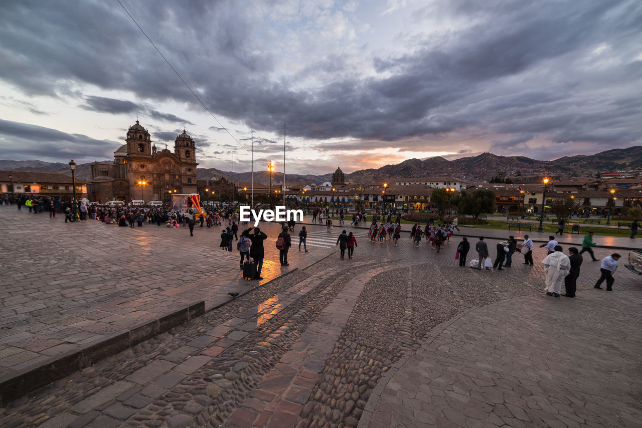 People at town square during sunset