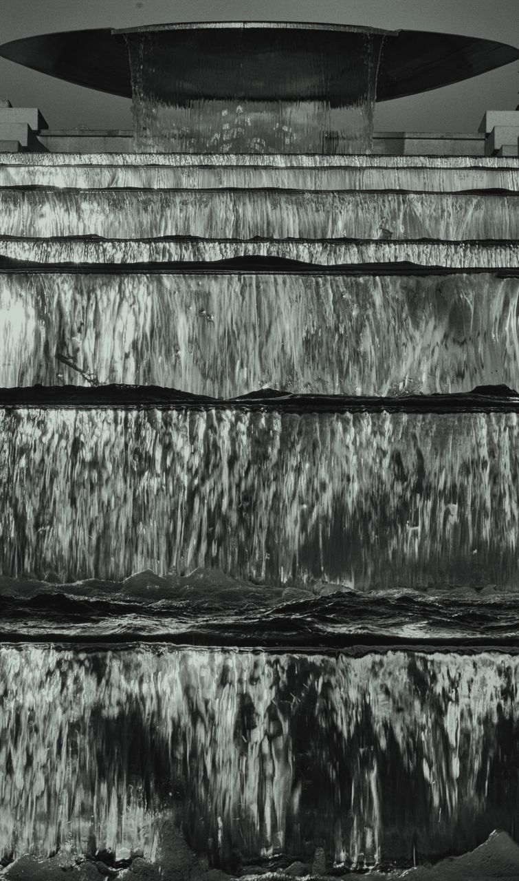 Close-up of water flowing on steps