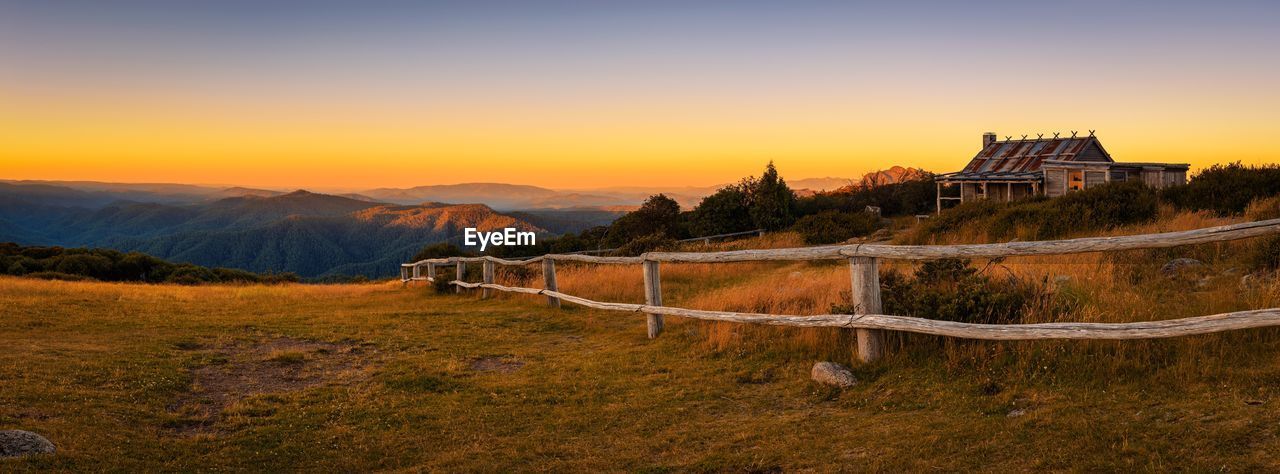 scenic view of mountains against sky during sunset