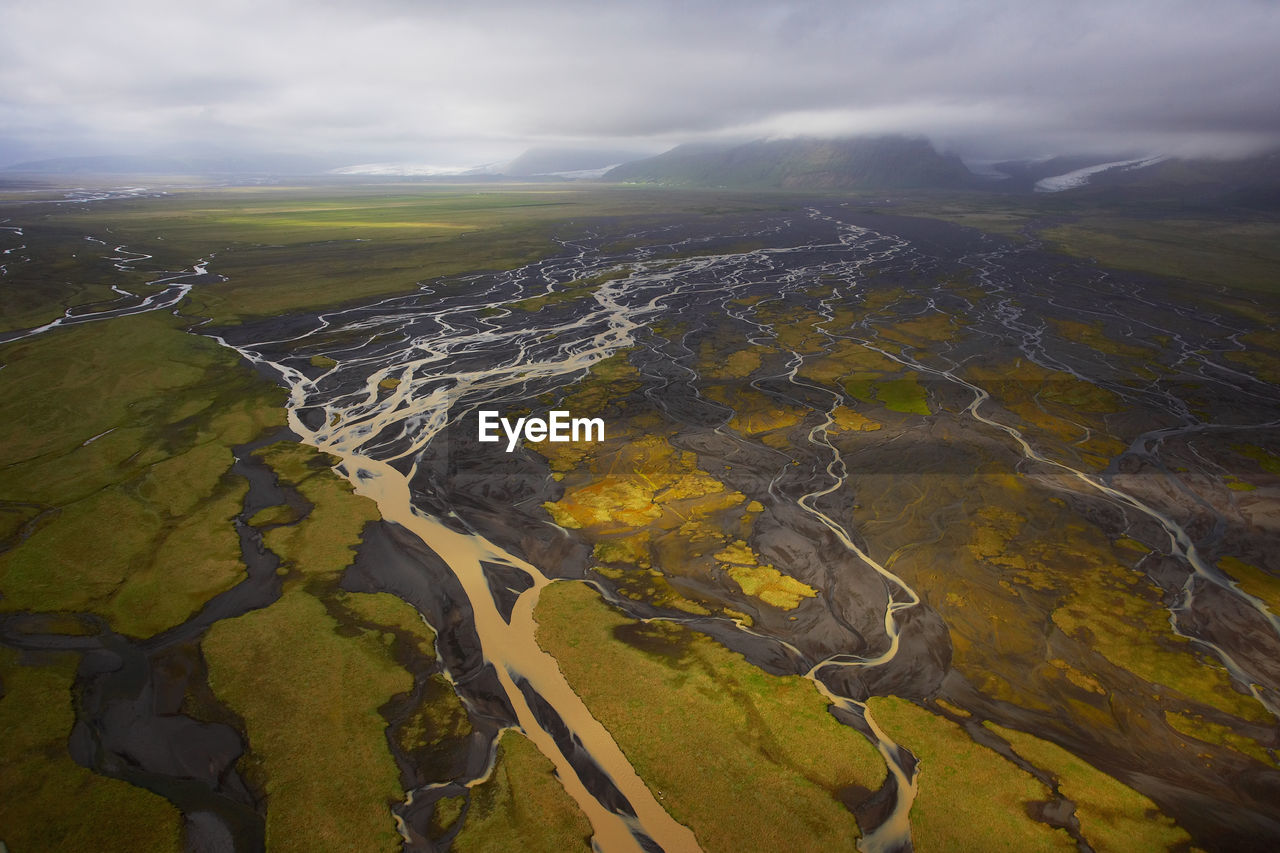 Aerial shot of meandering glacier rivers in south iceland