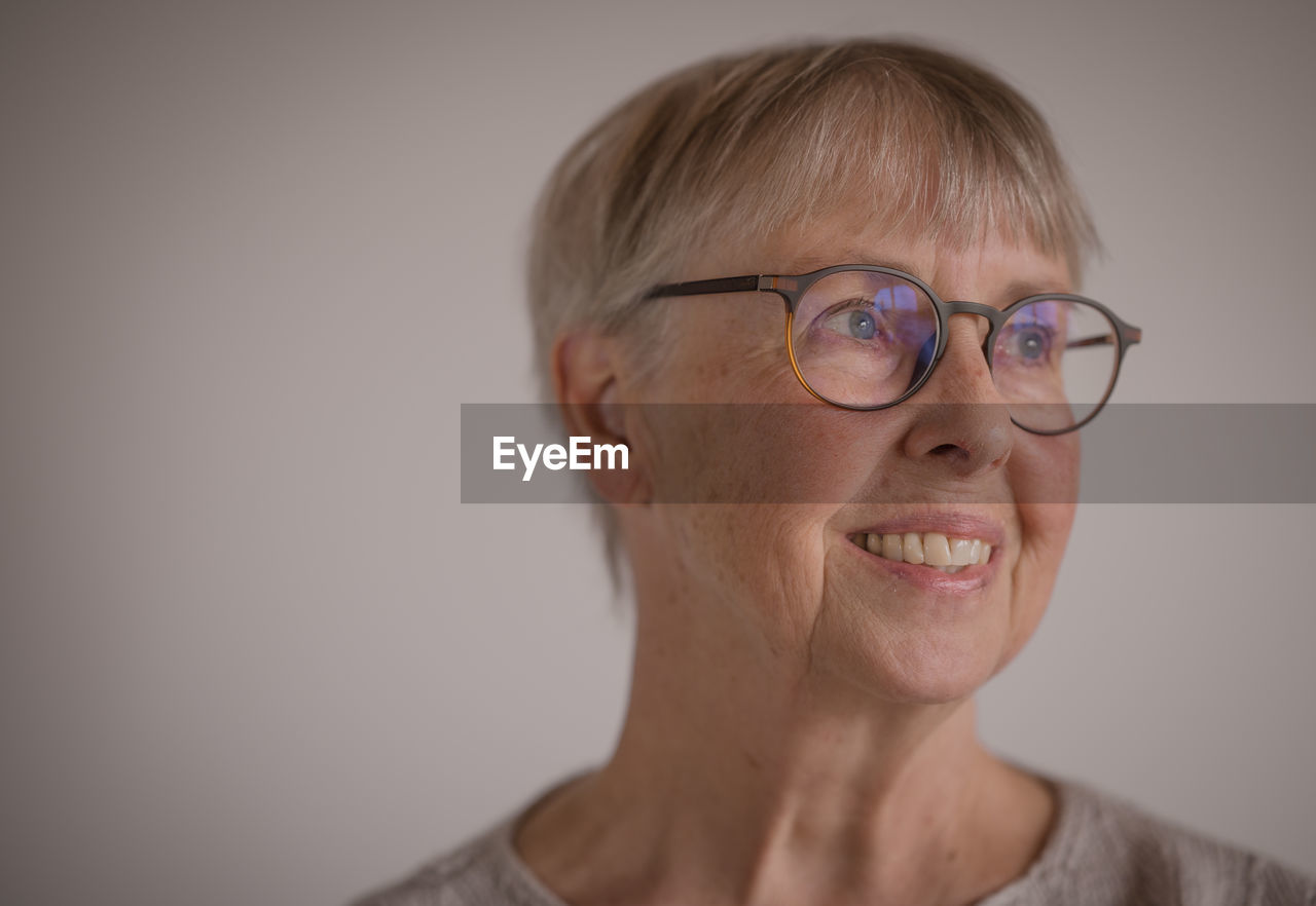 Close-up of woman wearing eyeglasses