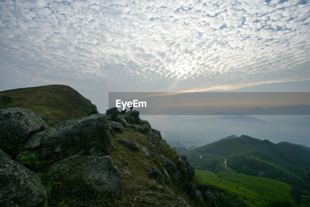 SCENIC VIEW OF MOUNTAINS AND SKY