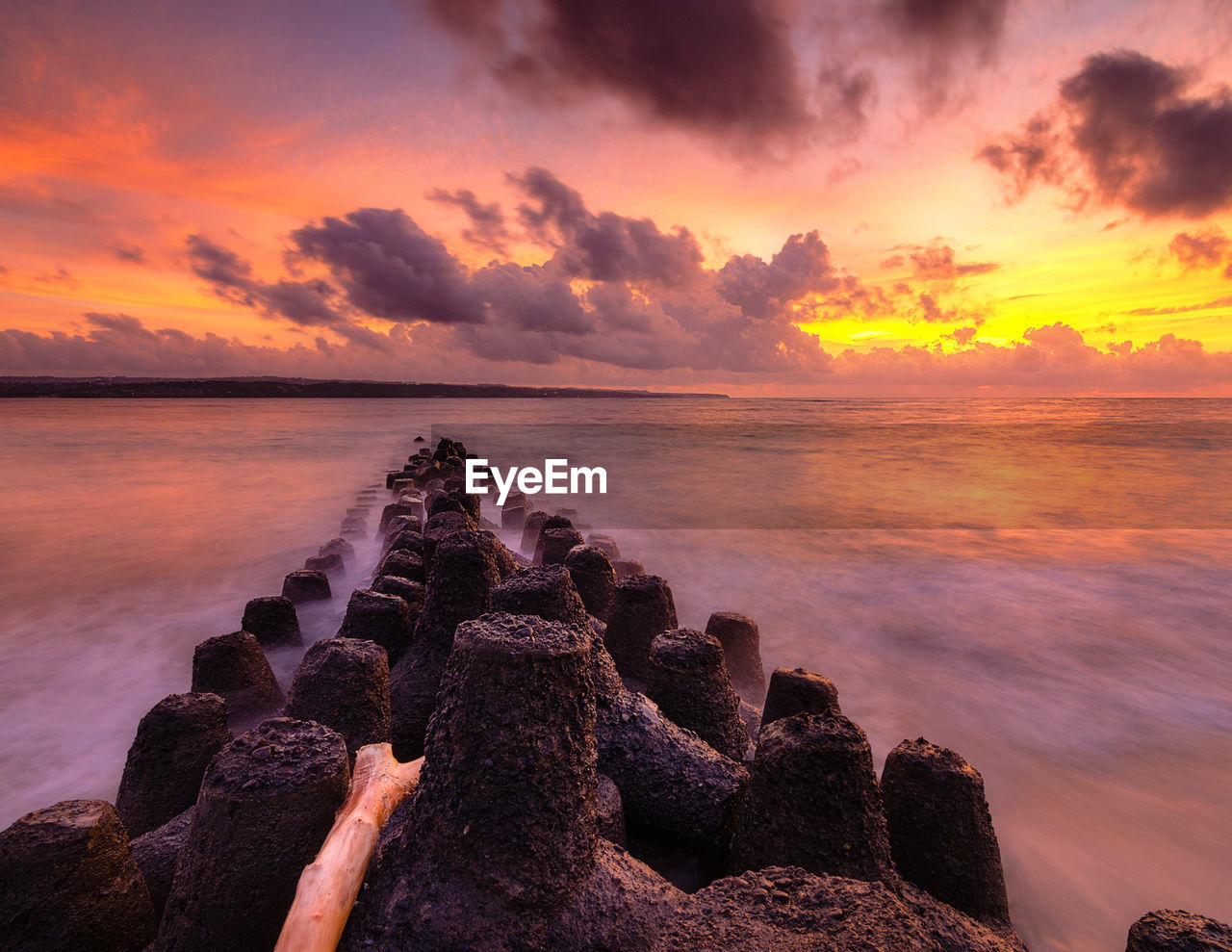 Scenic view of sea against sky during sunset