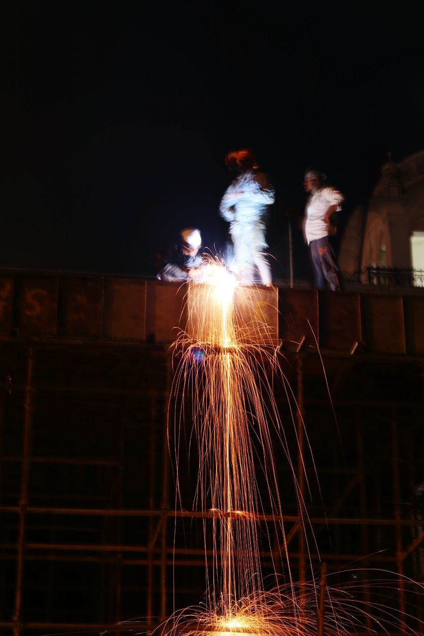 FIREWORK DISPLAY AT NIGHT DURING FESTIVAL