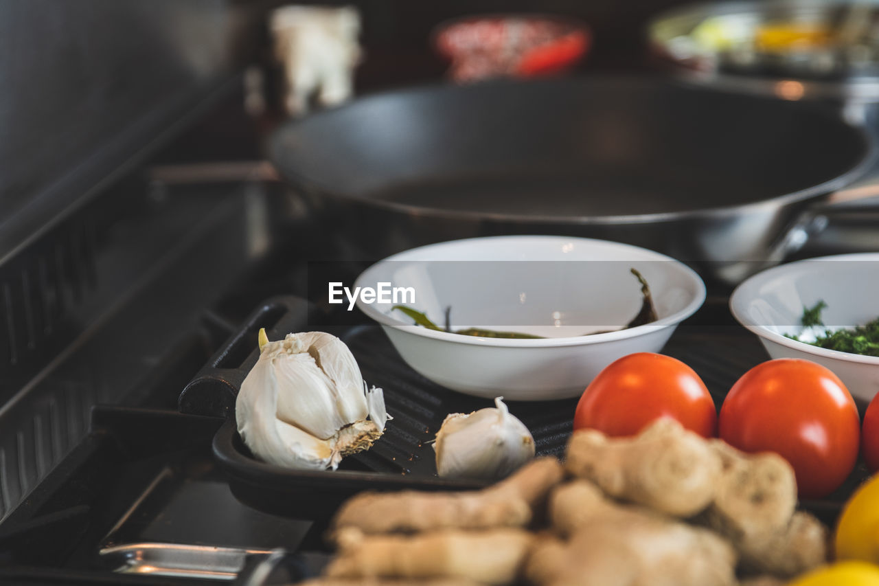 Close-up of fruits and vegetables in kitchen. 