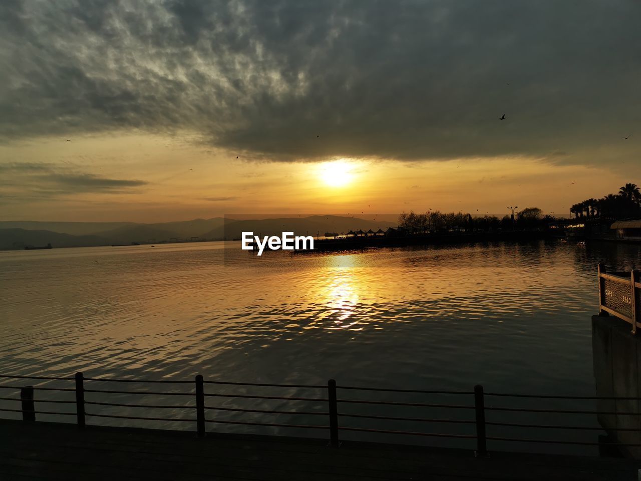 SCENIC VIEW OF SEA DURING SUNSET