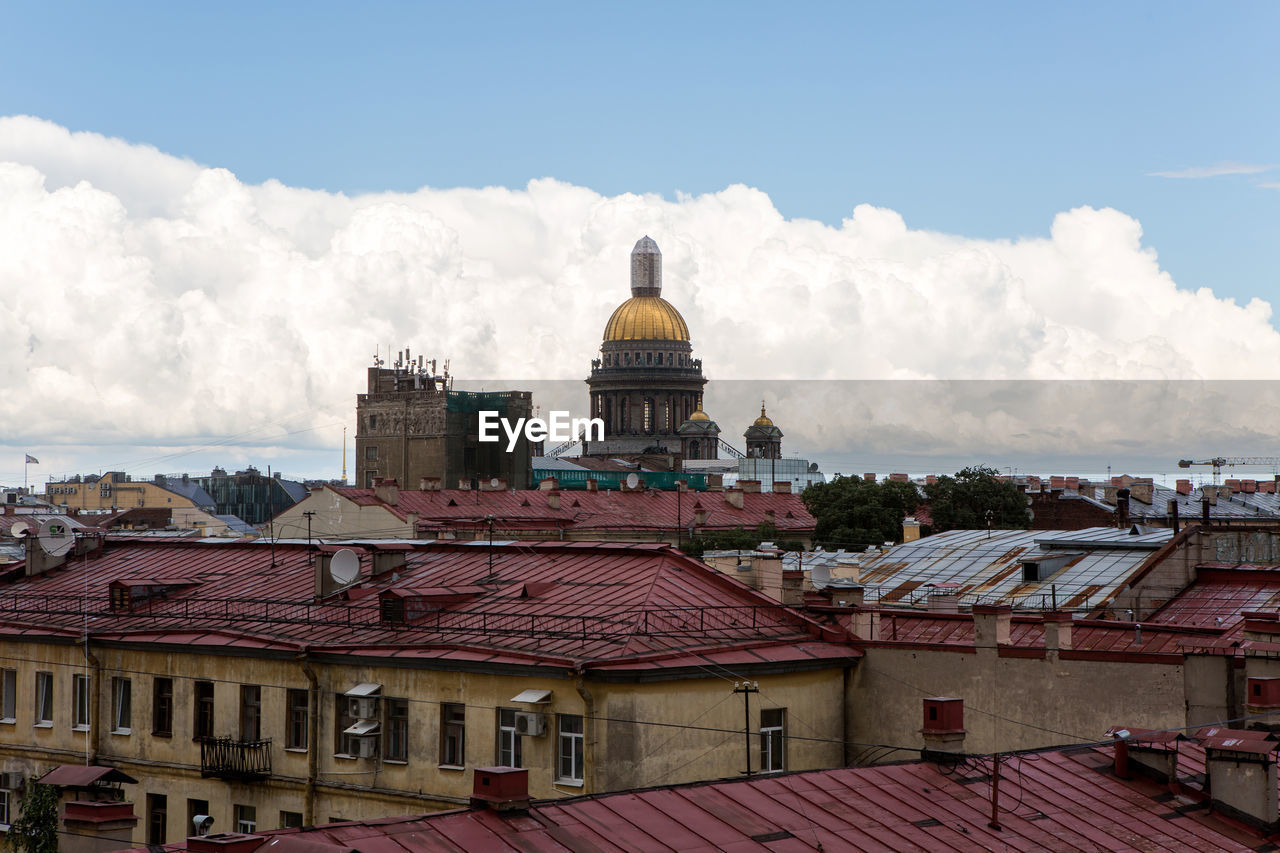 St. isaac cathedral by architect auguste montferrand. roofs of the old houses