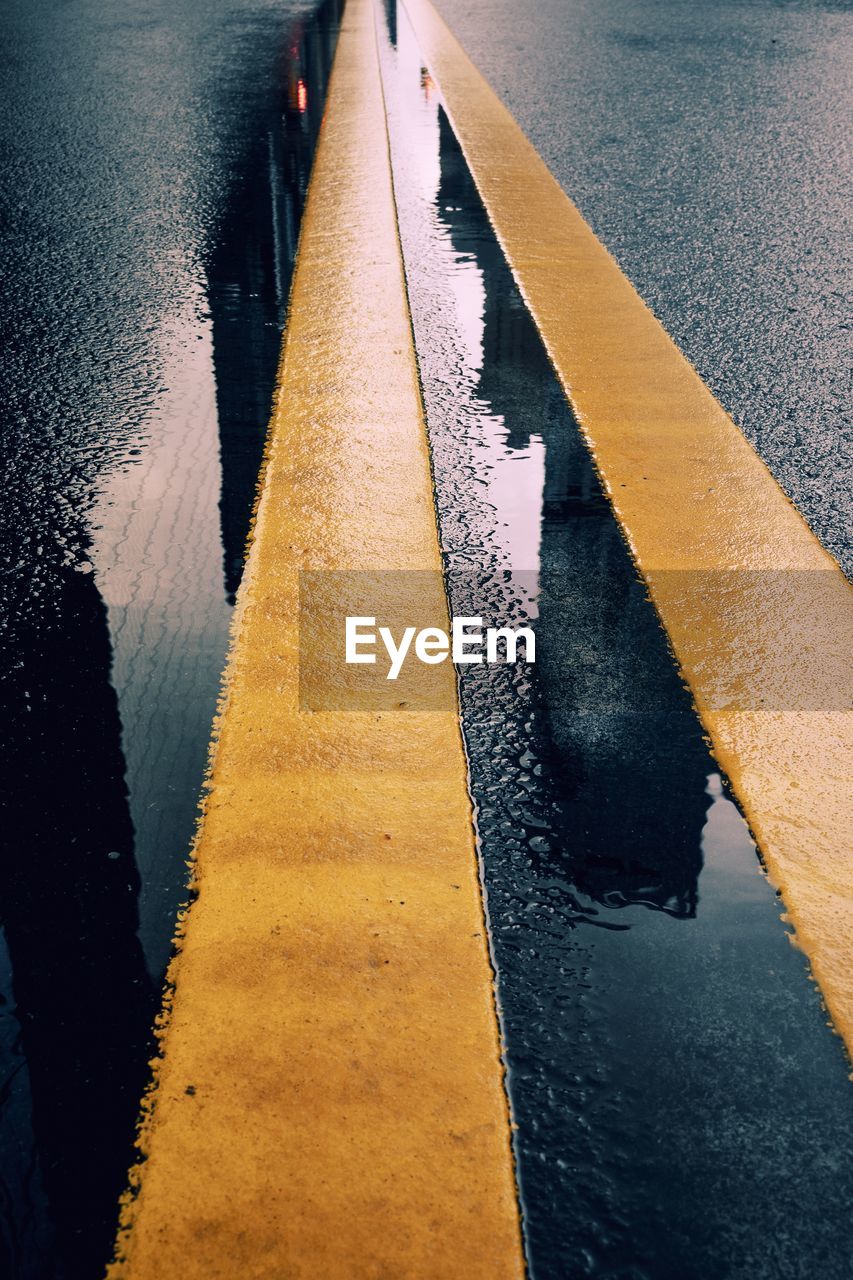 High angle view of wet road during rainy season