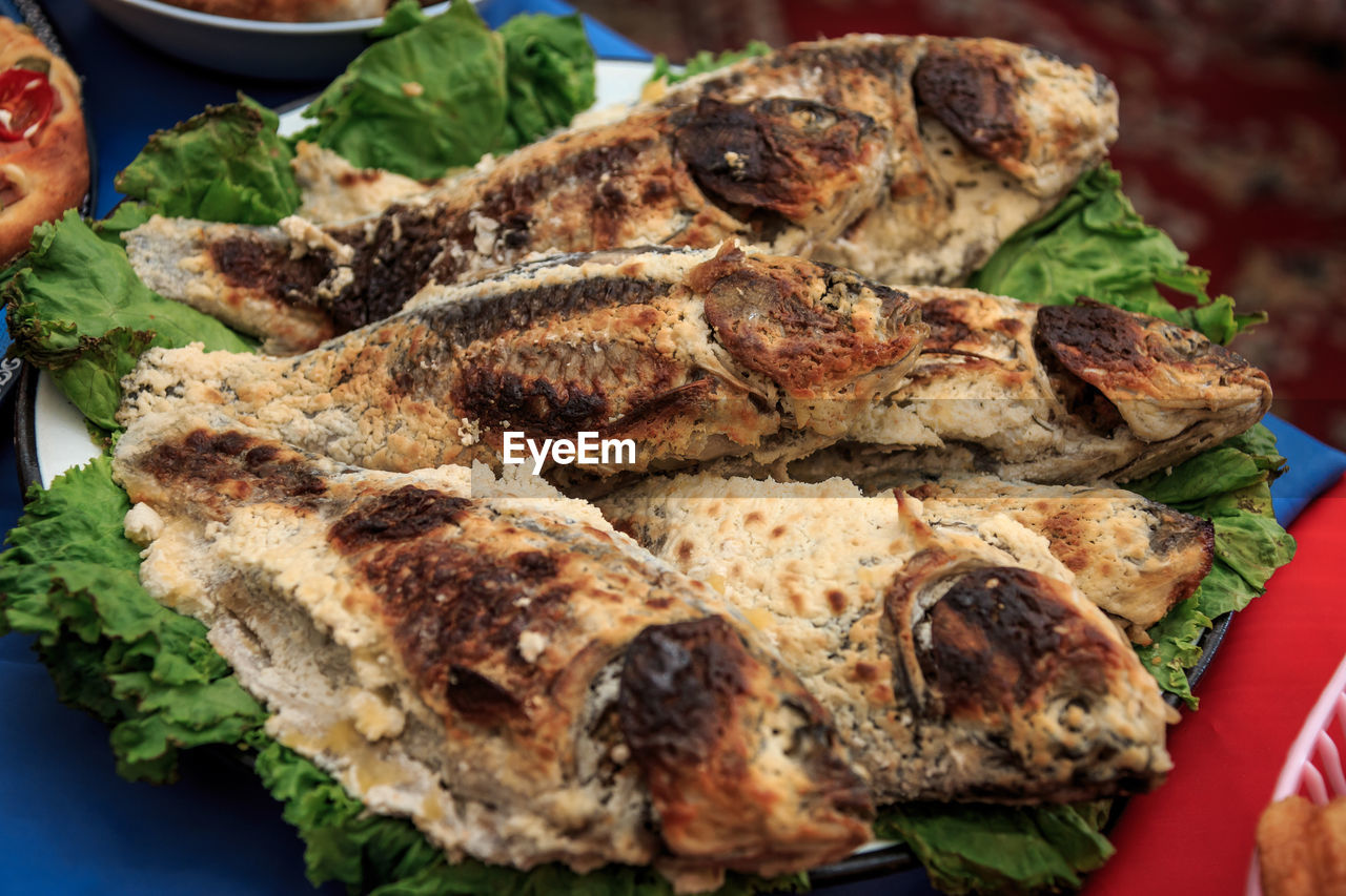 Close-up of fish on barbecue grill