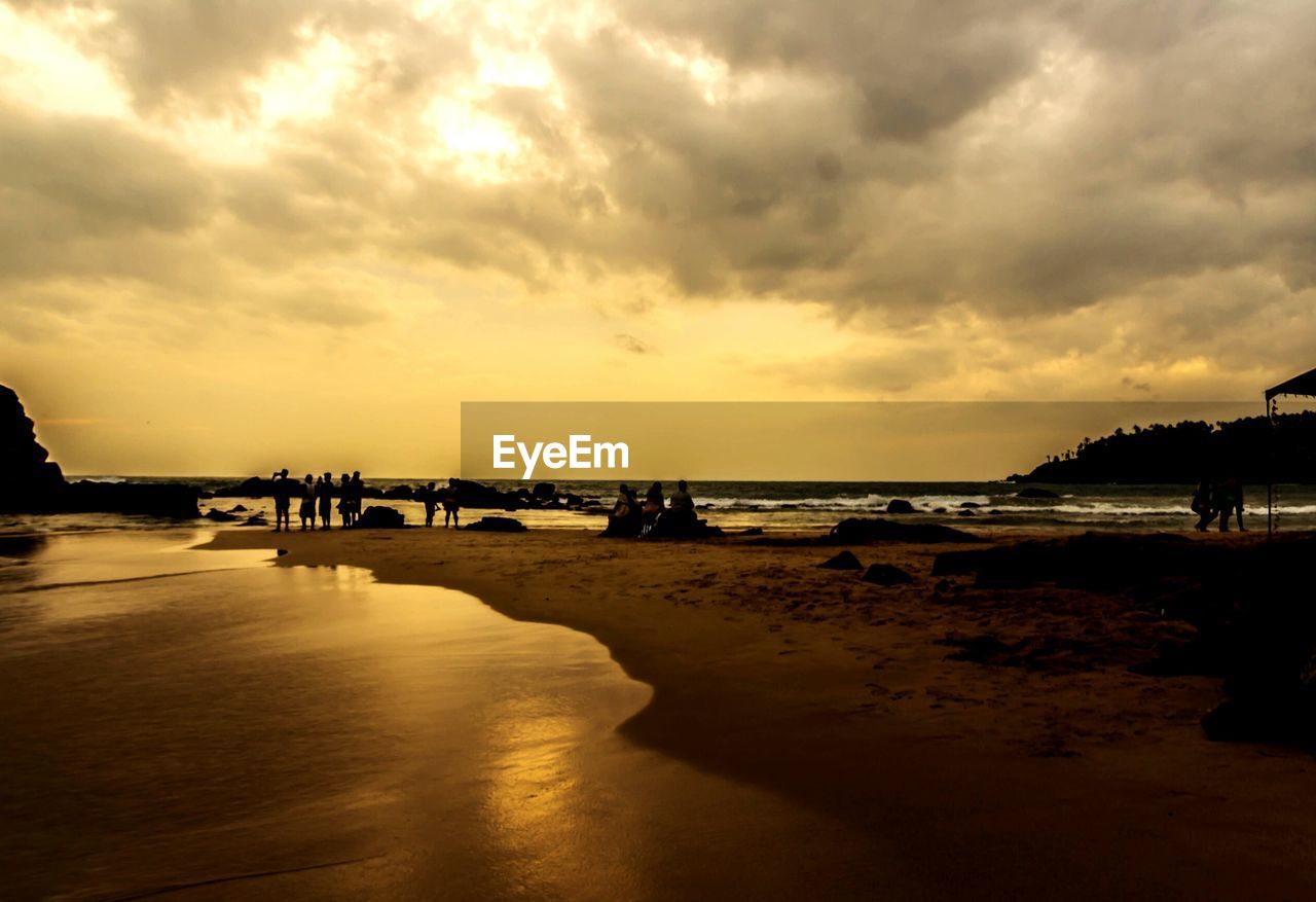 SCENIC VIEW OF SEA AGAINST DRAMATIC SKY