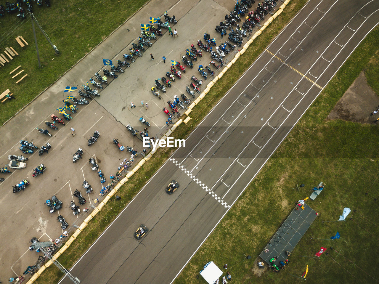 High angle view of parking lot by street