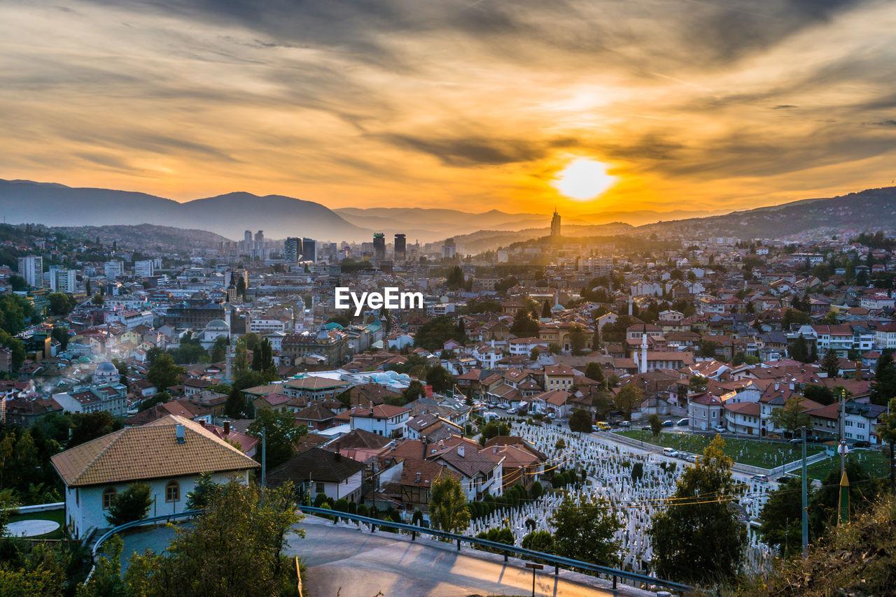 High angle view of townscape against sky during sunset