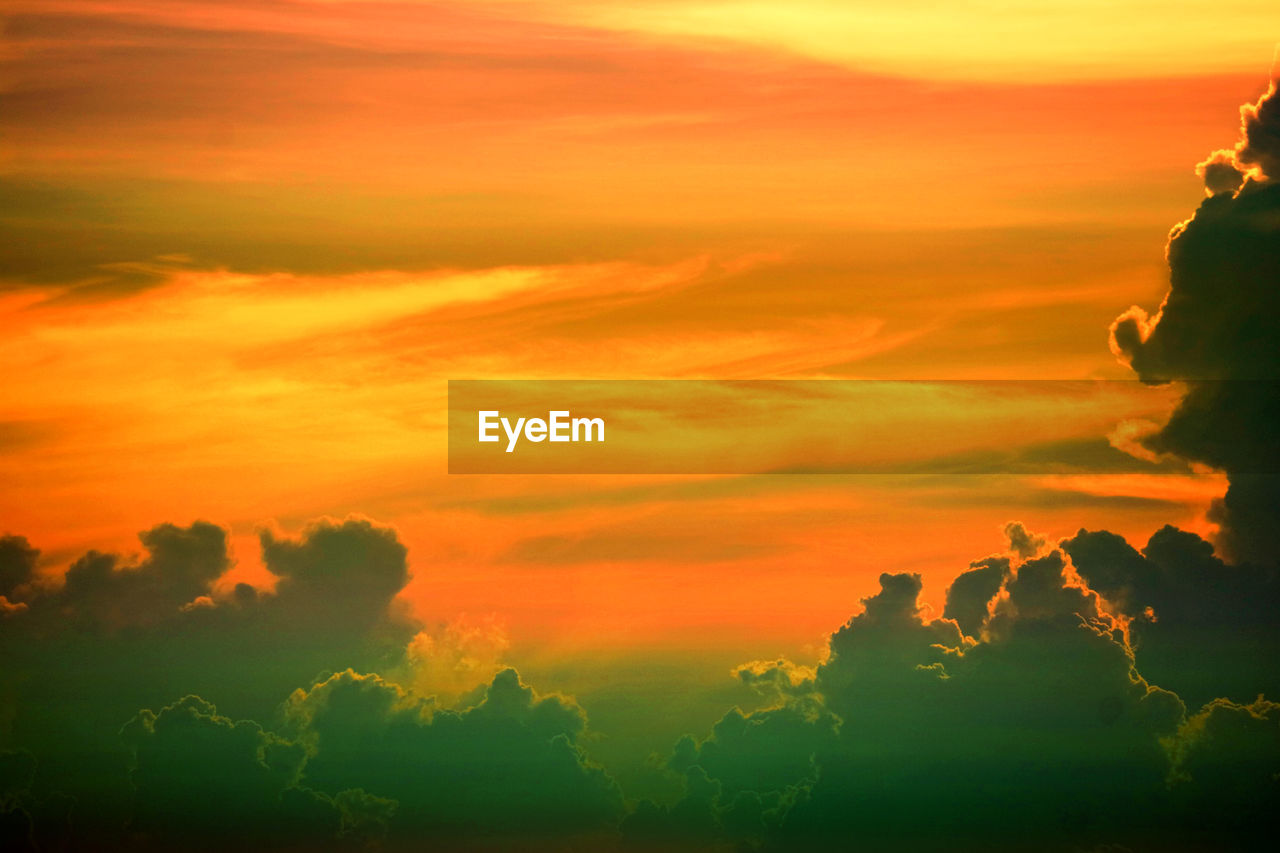 Scenic view of dramatic sky during sunset