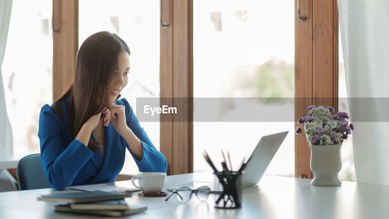 Businesswoman working at office