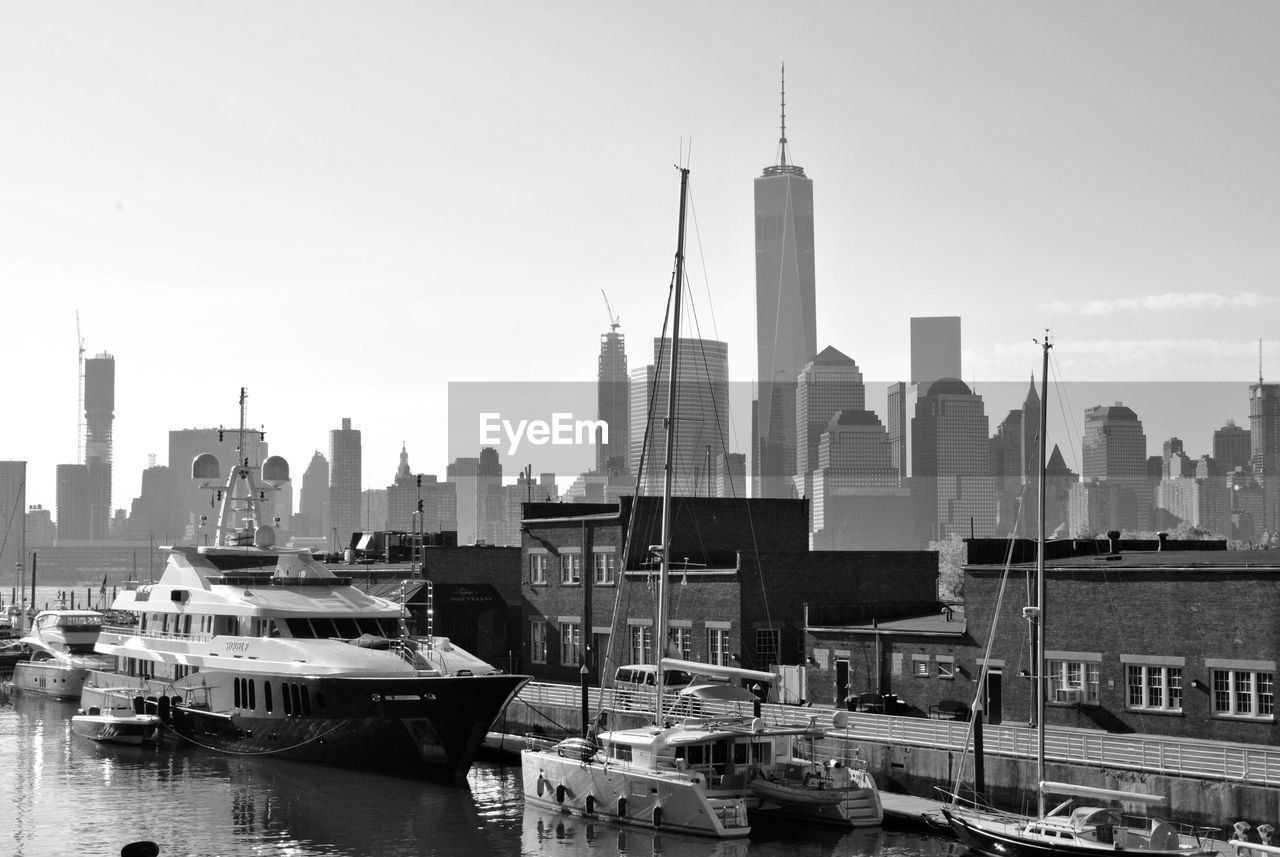 Boats moored along the quayside in new york city