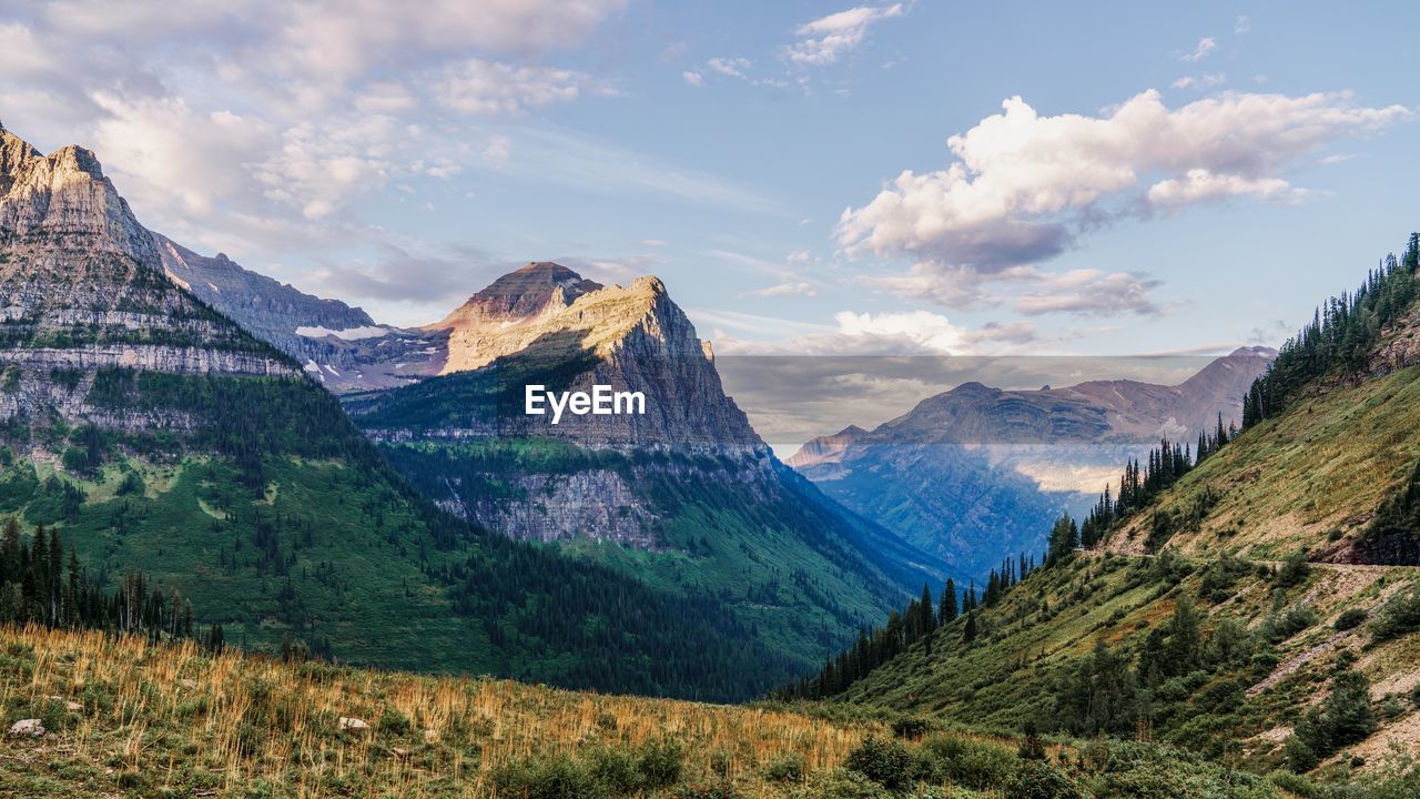 Panoramic view of landscape against cloudy sky