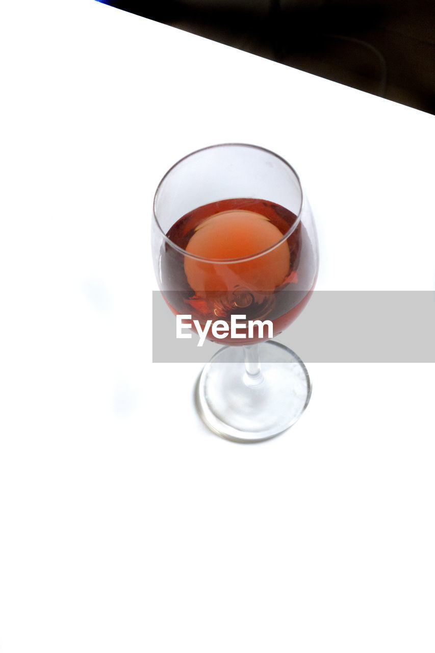 High angle view of wineglass on table