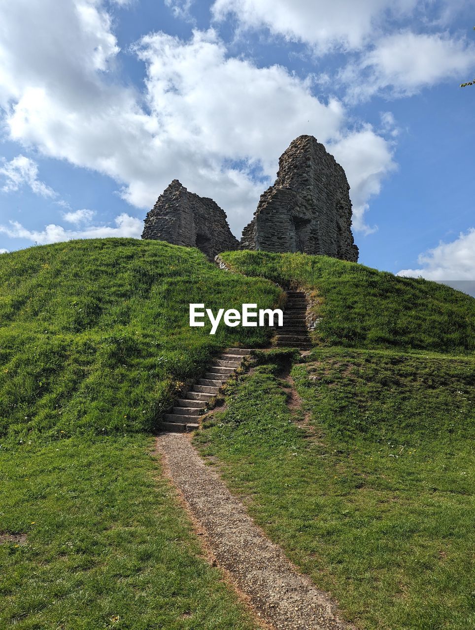 low angle view of old ruins against sky