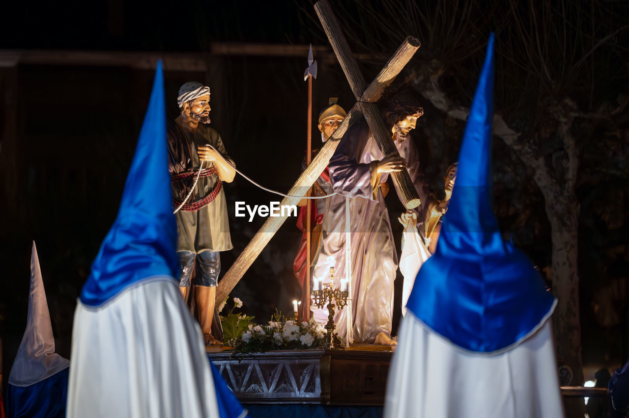 musical theatre, performance art, blue, celebration, clothing, stage, religion, tradition, traditional clothing, dancing, spirituality, event, belief, performing arts, adult, person, performance, night